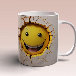 May include: White ceramic mug with a smiling yellow face breaking through a cracked white wall design.