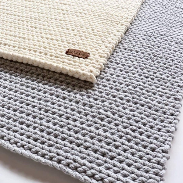 Hand knitted cotton area rug, Chunky grey carpet with a minimalist design, For living room in nordic style.