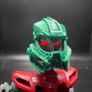 Bionicle Battle Damaged Kanohi Miru Noble Prototype (Dark Green)