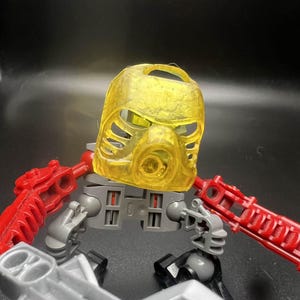 G1 Bionicle Kanohi Mask of Shielding Hau (Yellow)