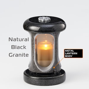Memorial candle holder for the grave, A stone lantern for candles on the grave of the deceased, Memorial candles for the cemetery