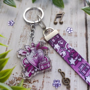 Cordón corto de tela con dije de poción mágica de música pop | llavero | correa para la muñeca | titular de la insignia