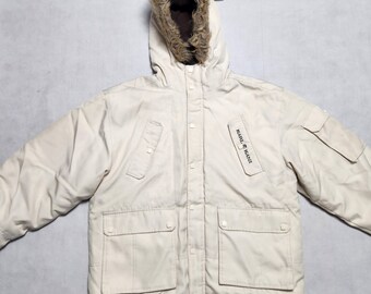 Karl Kani Puffer Jacket Bleached Sand Embroidery Logo Faux Fur Hood Zip Rubber Buttons Multipocket Sleeve Pocket