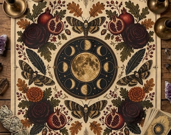 May include: A square altar cloth featuring a central moon phase cycle, surrounded by four moths with skull markings, pomegranates, dark roses, oak leaves, and feathers. The design is printed in earthy tones on a cream-colored fabric background.