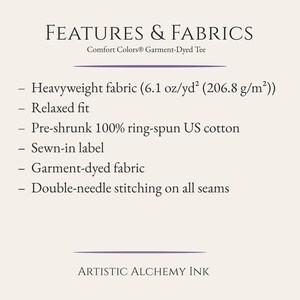 May include: A cream-colored graphic with the text "FEATURES & FABRICS" and "Comfort Colors&reg; Garment-Dyed Tee." The text lists features including heavyweight fabric (6.1 oz/yd&sup2;), relaxed fit, pre-shrunk cotton, a sewn-in label, garment-dyed fabric, and double-needle stitching. The bottom text reads "ARTISTIC ALCHEMY INK."
