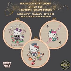 Peut inclure: Un ensemble de broderie au point de croix avec trois motifs Hello Kitty dans des cercles en bois. Les thèmes incluent "Goth Chic", "Tea Party" et "Kawaii Artist". Le texte indique "ROCKCOCO KITTY CROSS STITCH SET".
