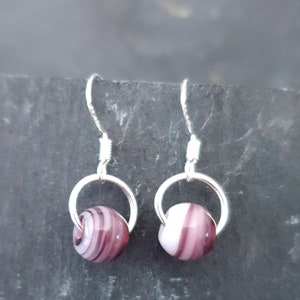 Purple glass bead earrings.