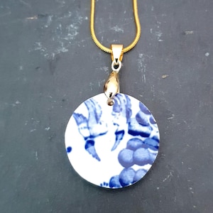 Blue Willow - Recycled vintage ceramic pendant on a gold plated snake chain.