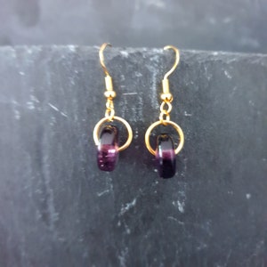 Purple glass bead earrings.