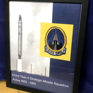 Framed 533rd Strategic Missile Squadron display with original patch, Titan II
