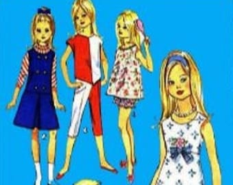 May include: Five paper dolls with different outfits. The dolls are wearing a blue dress with a white collar, a red and white top with white pants, a floral dress, a white dress with a floral pattern, and a yellow cape.