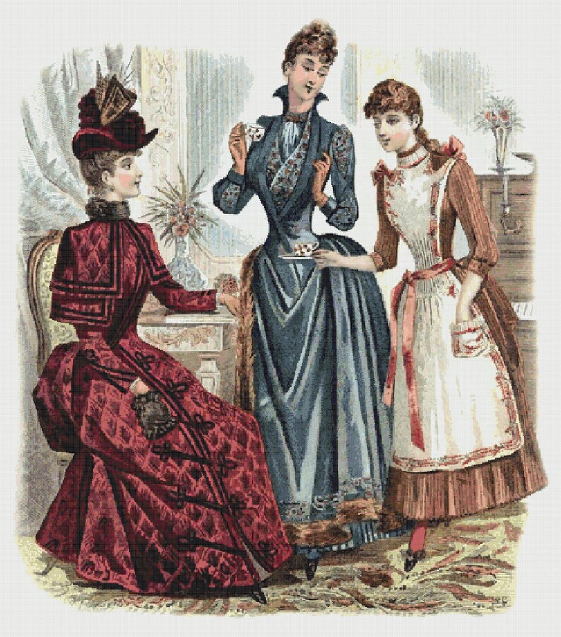 May include: Three women in vintage clothing are gathered around a table, enjoying tea time. The woman in the center is wearing a blue dress with a floral pattern, while the woman on the left is wearing a red dress with black trim. The woman on the right is wearing a white apron over a brown dress.