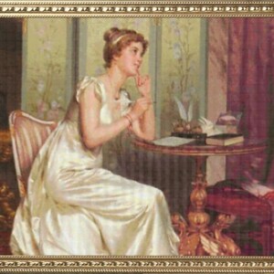 May include: A woman in a white dress sits at a table with a book and a quill pen. She is looking thoughtfully at the quill pen. The table is made of wood and has a dark brown finish. The woman is sitting in a chair with a white cushion. The background is a light brown wall with a floral pattern.