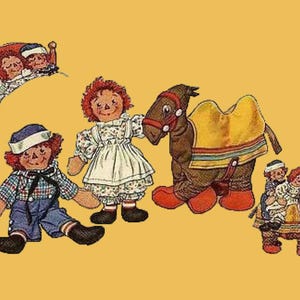 May include: Illustration of Raggedy Ann and Andy dolls with a camel and a bed. Raggedy Ann is wearing a floral dress, and Andy is in overalls and a sailor hat. The camel has a yellow blanket.