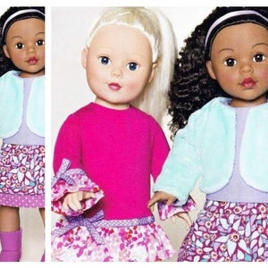 May include: Three dolls with varying skin tones and hair colors are dressed in similar outfits. Each doll wears a pink long-sleeved top, a floral skirt, and a light blue jacket. The dolls have different hairstyles, including blonde and black curly hair.