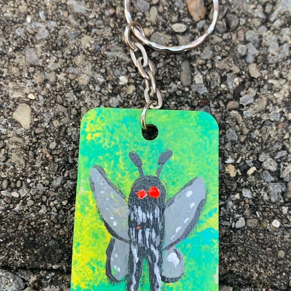 Green Moth Man Keychains