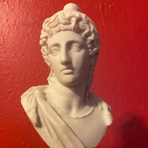 Mithras Bust: Ancient Iranian Deity Sculpture