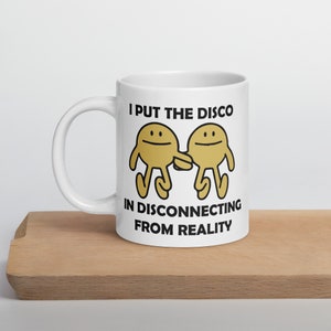 "Weiße, lustige ""I Put The Disco In Trennen von der Wirklichkeit"" Kaffee Tasse."