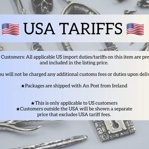 May include: A rectangular informational graphic with a light blue to white gradient background. The text reads USA TARIFFS with two American flag icons. Below, bullet points explain that US import duties are prepaid and included in the price.