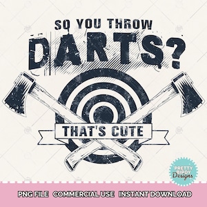 May include: A distressed graphic design features the text "SO YOU THROW DARTS? THAT'S CUTE" above a target and crossed axes. The design is in dark blue and white, with a vintage, worn look. The image is suitable for apparel or decor.