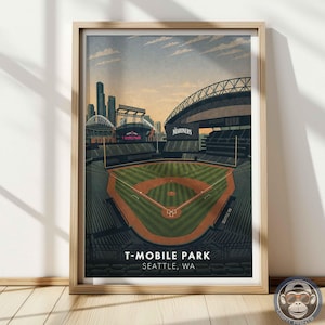 May include: Framed art print of T-Mobile Park in Seattle, WA. The baseball stadium is depicted in a vintage style with a green field, brown infield, and the word "Mariners" on the stadium. The sky is a mix of orange and blue.