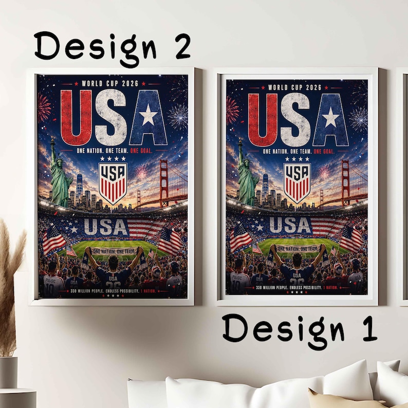 May include: Two framed posters titled Design 2 and Design 1, featuring a World Cup 2026 graphic. The artwork displays the Statue of Liberty, the Golden Gate Bridge, a soccer stadium, and the text USA, One Nation, One Team, One Goal.