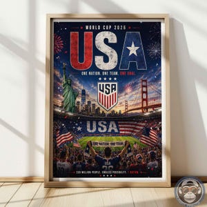 May include: A framed poster for the World Cup 2026 featuring the text USA, One Nation. One Team. One Goal. The image displays the Statue of Liberty, the Golden Gate Bridge, a soccer stadium filled with fans, and the USA soccer team crest.