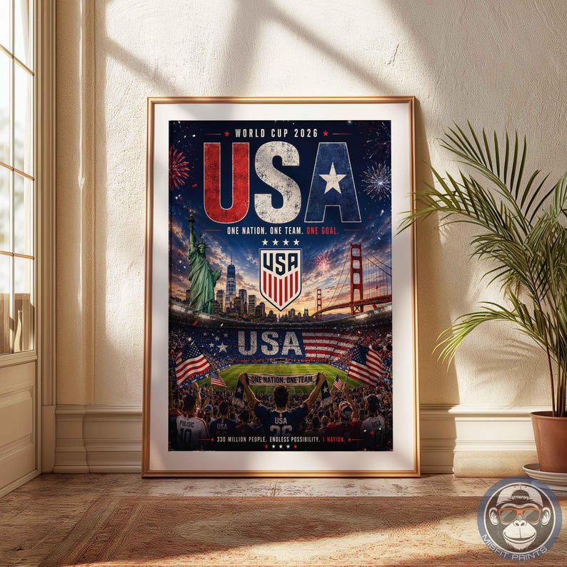 May include: A vertical poster titled World Cup 2026 USA featuring a dark blue background with fireworks, the Statue of Liberty, a city skyline, the Golden Gate Bridge, a soccer stadium, the USA crest, and the text One Nation. One Team. One Goal.