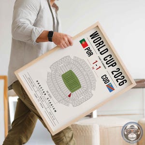 May include: A framed print featuring a World Cup 2026 stadium map for a match between Portugal and DR Congo. The design includes the text World Cup 2026, A Night to Remember, the score 1-1, and details for Houston Stadium, Section 106, Row 37, Seat 13-16.