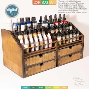 May include: Wooden paint organizer with drawers for storing small bottles of paint. The organizer has multiple shelves for storing bottles of different sizes. The organizer is made of wood and has a natural wood finish.