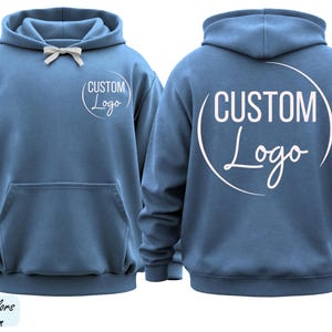 A blue hoodie with the text "CUSTOM Logo" printed on the back.
