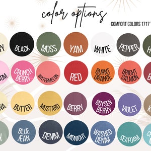 May include: A chart of 36 different color options for t-shirts. The colors are arranged in a grid with four rows and nine columns. The colors include: Ivory, Black, Moss, Yam, White, Pepper, Hemp, Blossom, Crunch Berry, Watermelon, Red, Burnt Orange, Bright Salmon, Brick, Banana, Butter, Mustard, Berry, Boysen Berry, Violet, Khaki, Bay, Blue Jean, Denim, Midnight, Washed Denim, Seafoam, Chalky Mint.