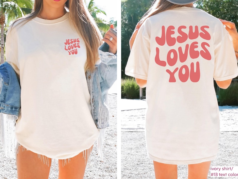 a woman wearing a jesus loves you t - shirt