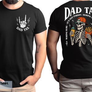 A black t-shirt with a graphic design on the back, depicting a skeleton wearing sunglasses and holding a cup of coffee. The design includes text that reads "DAD TAX" and "IT'S NOT POSSON, MAKING SURE IT'S NOT POSSON".