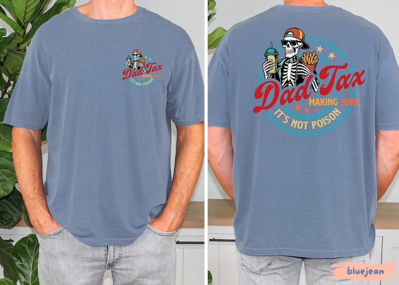 May include: Blue short-sleeve t-shirt with a graphic on the front and back. The front graphic says "Dad Tax" with a skeleton driving a car. The back graphic says "Dad Tax, making sure it's not poison" with a skeleton holding a drink and fries.