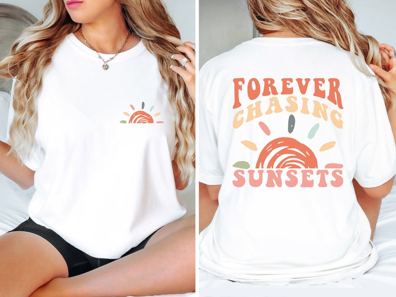 May include: White t-shirt with a colourful sunset graphic on the front and the text "FOREVER CHASING SUNSETS" on the back.