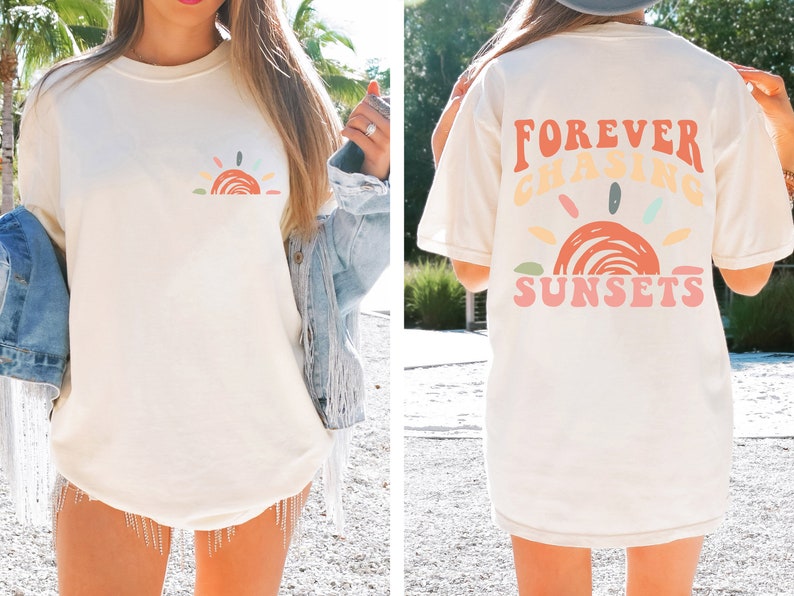 May include: A white t-shirt with a colourful sunset graphic and the text "FOREVER CHASING SUNSETS" on the back.