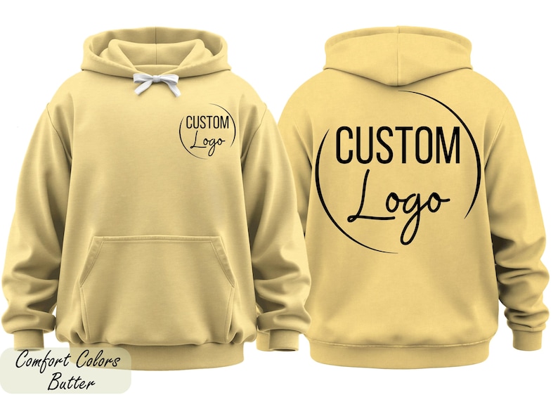 A yellow hoodie with the text "CUSTOM Logo" printed on the back.