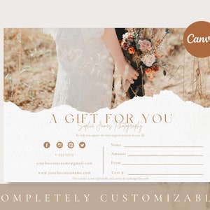 May include: A gift certificate for photography services from Sophie James Photography. The certificate is a white, torn-edged card with brown text. The text reads "A Gift For You" and "Sophie James Photography". The certificate has a brown background image of a bride holding a bouquet of flowers.