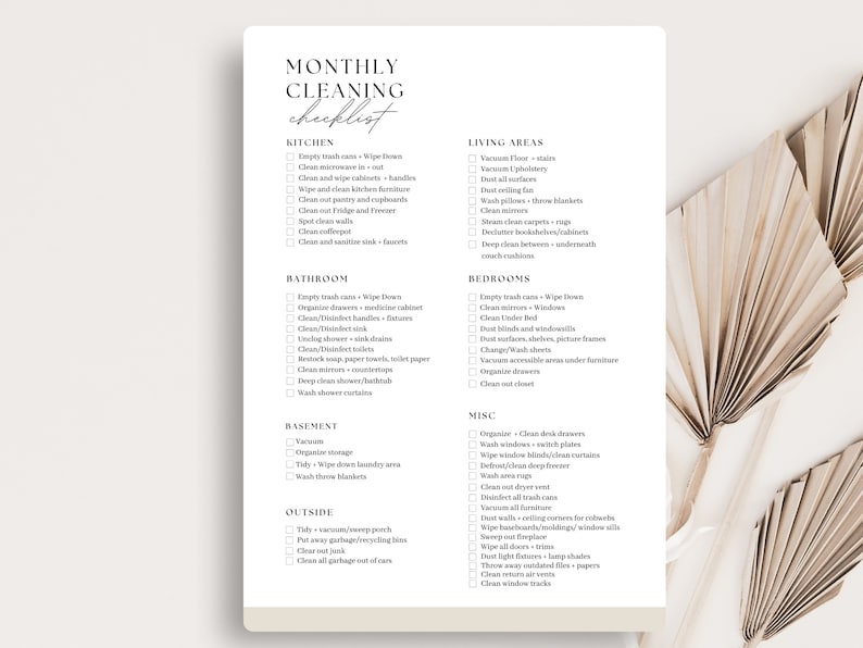 May include: A printable monthly cleaning checklist with a beige background and black text. The checklist is divided into categories such as kitchen, bathroom, living areas, bedrooms, basement, outside, and misc. Each category has a list of cleaning tasks to complete.