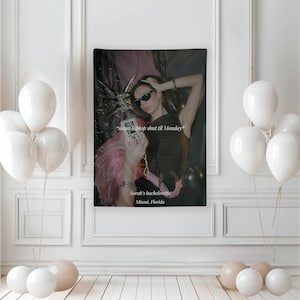 May include: A wall tapestry featuring a photograph of a person wearing sunglasses and holding a camera. The text on the tapestry reads "slams laptop shut til Monday" and "Sarah's bachelorette Miami, Florida". White balloons decorate the room.