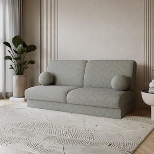 Böjd ljusgrå bouclébäddsoffa – Japandi minimalistisk bäddsoffa, mjuk neutral ton, med förvaring