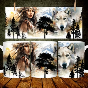 May include: White ceramic mug featuring a watercolor design of a Native American woman and a wolf. The design includes a forest and mountain backdrop with shades of brown, orange, and blue. The mug has a curved handle and a glossy finish.