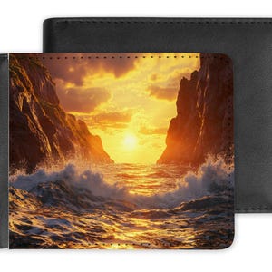 May include: A leather wallet with a sunset scene printed on the front. The scene features a rocky coastline with waves crashing against the shore. The sun is setting in the distance, casting a golden glow over the water.
