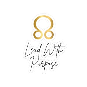 May include: A white sticker with a gold-colored abstract design and the words "Lead With Purpose" in black script. The sticker has a clean, minimalist aesthetic.