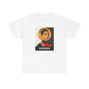 May include: White t-shirt featuring a graphic of a woman with curly hair wearing a red, yellow and black athletic uniform. The graphic has the word "RODMAN" printed below it.
