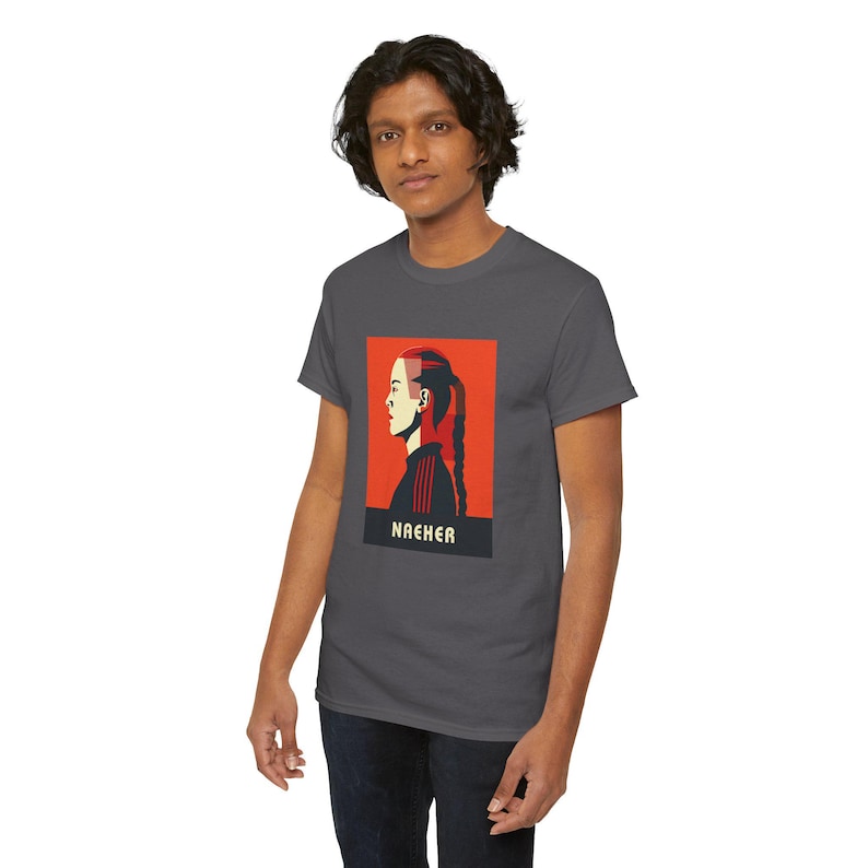 May include: A dark grey t-shirt with a red and white graphic of a woman's profile with the word "NACHER" printed below the graphic.