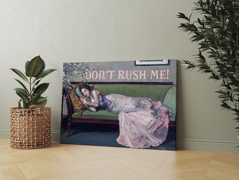 May include: A painting of a woman in a pink dress lying on a green couch. The woman is asleep and the couch is decorated with pink flowers. The text "DON'T RUSH ME!" is written in pink letters above the couch.