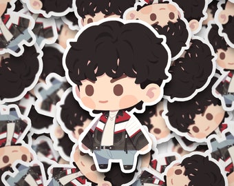 May include: A sticker sheet featuring multiple cartoon illustrations of a person with black hair, wearing a black and white striped jacket, red shirt, and blue jeans. The person is smiling and has a friendly expression.
