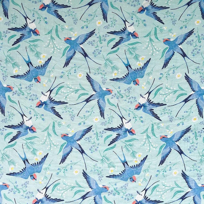 May include: A repeating pattern of blue swallows with red accents and white bellies, set against a light teal background with white and green floral elements. The swallows are depicted in various flying positions.